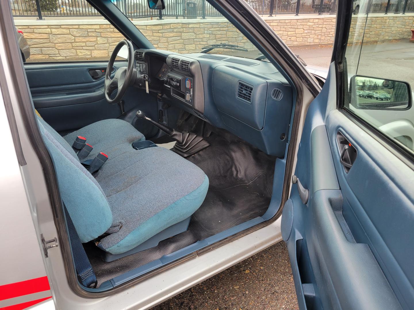 1994 Silver /Brown Chevrolet S10 Pickup (1GCCS144XR8) with an 2.2L I4 engine, 5 Speed Manual transmission, located at 450 N Russell, Missoula, MT, 59801, (406) 543-6600, 46.874496, -114.017433 - Good running little truck. 5 Speed Manual Transmission. AM FM Cassette. Financing NOT Available. - Photo#6